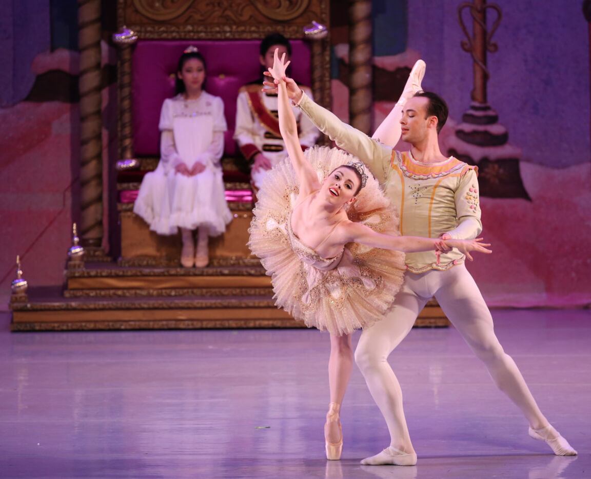 New York City Ballet principal dancers Tiler Peck (left) and Tyler Angle appear with...
