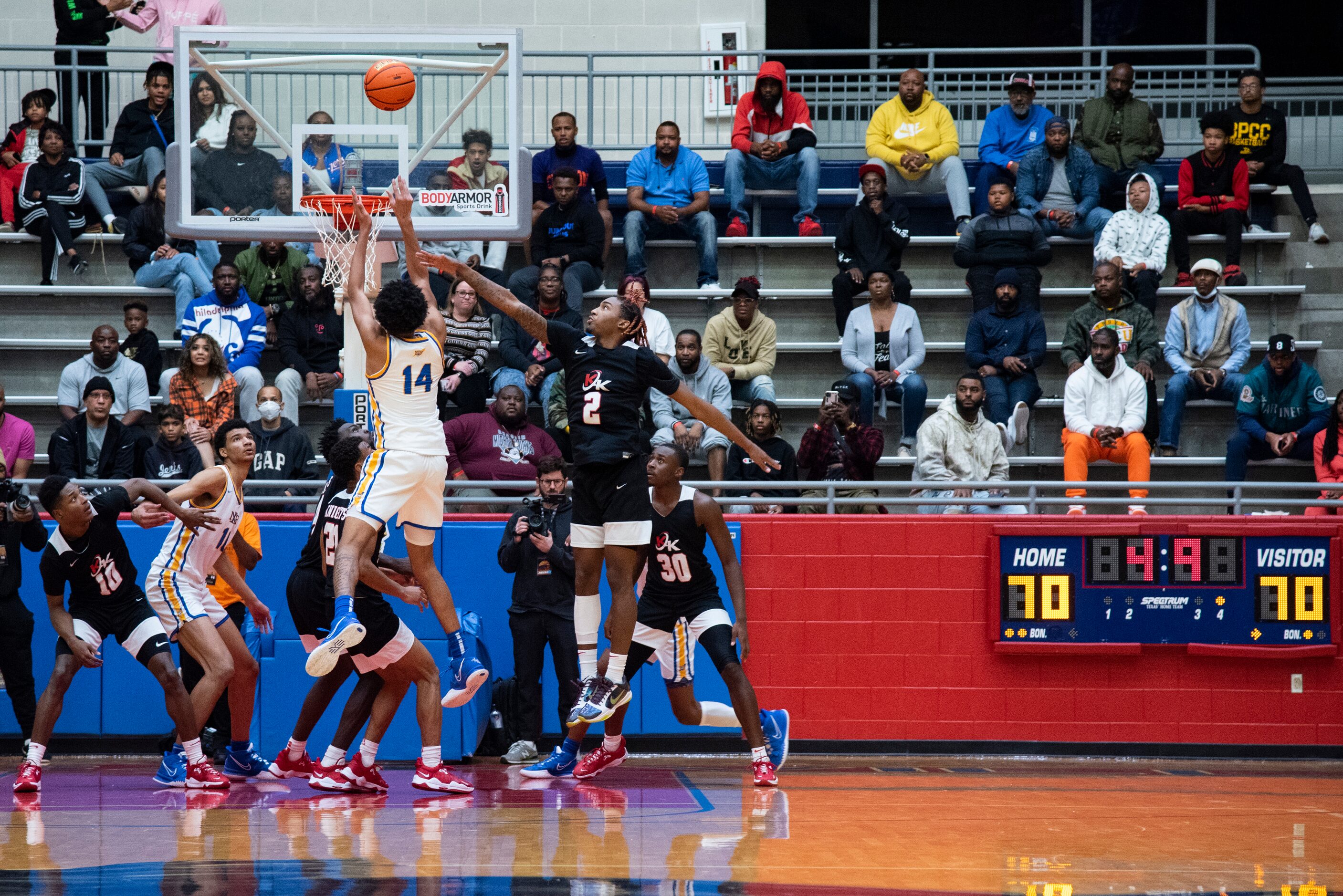 North Little Rock senior Nick Smith (14) shoots a jump shot as the game clock winds down...