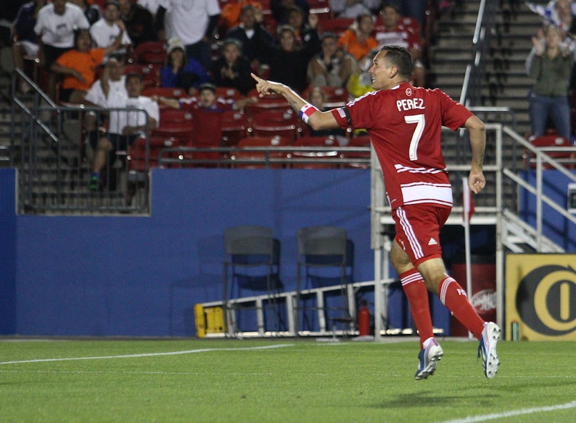 Blas Perez #7 celebrates a goal ainst Vancouver Whitecaps in 2013 at FC Dallas Stadium