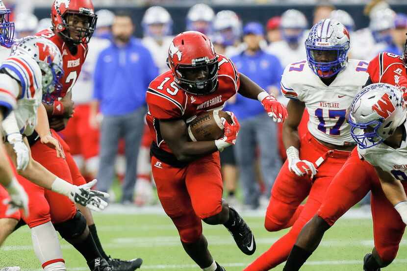 North Shore running back Carl Guillory (15) rushes against Westlake during the Texas UIL 6A...