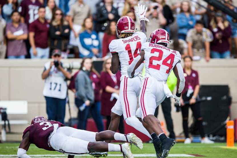 Alabama Crimson Tide wide receiver Tyrell Shavers (14) runs to the end zone for a touchdown...