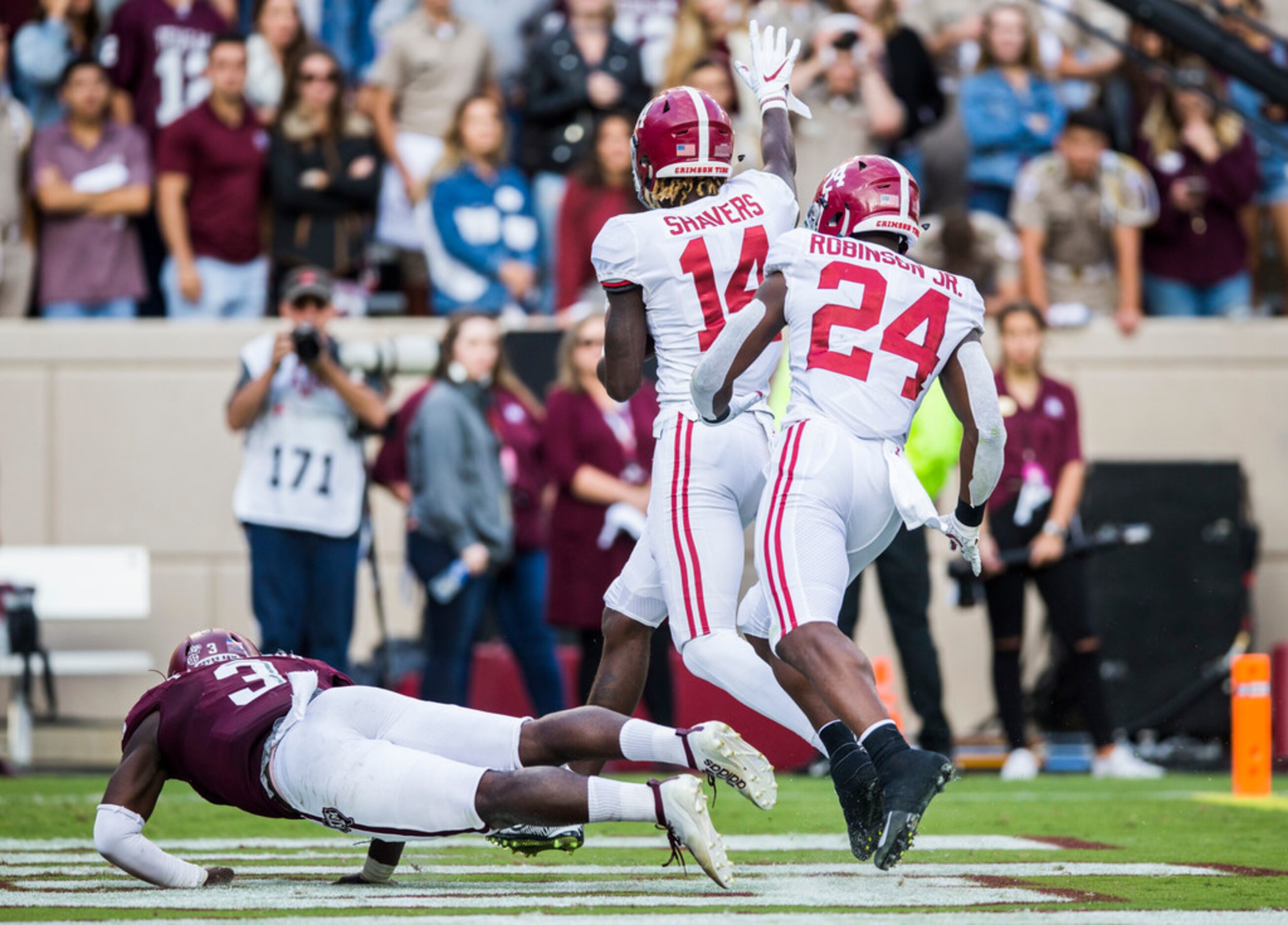 Alabama Crimson Tide wide receiver Tyrell Shavers (14) runs to the end zone for a touchdown...