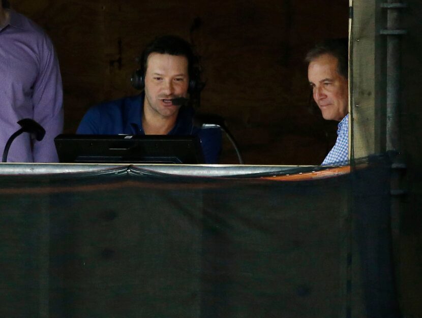 Former Dallas Cowboys player Tony Romo in the booth with Jim Nantz during the second half of...