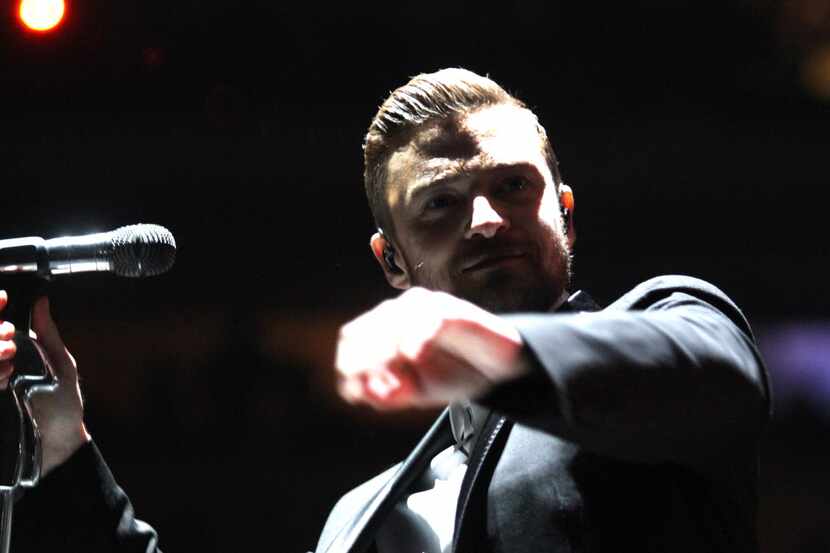 Justin Timberlake dances at the American Airlines Center on Dec. 3, 2014 in Dallas.