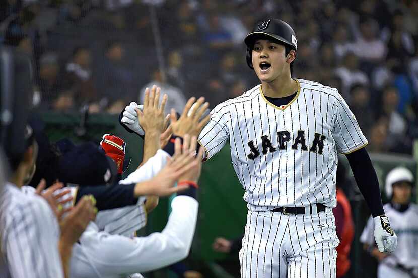 TOKYO, JAPAN - NOVEMBER 12:  Shohei Ohtani #16 of Japan celebrates after hitting a solo...