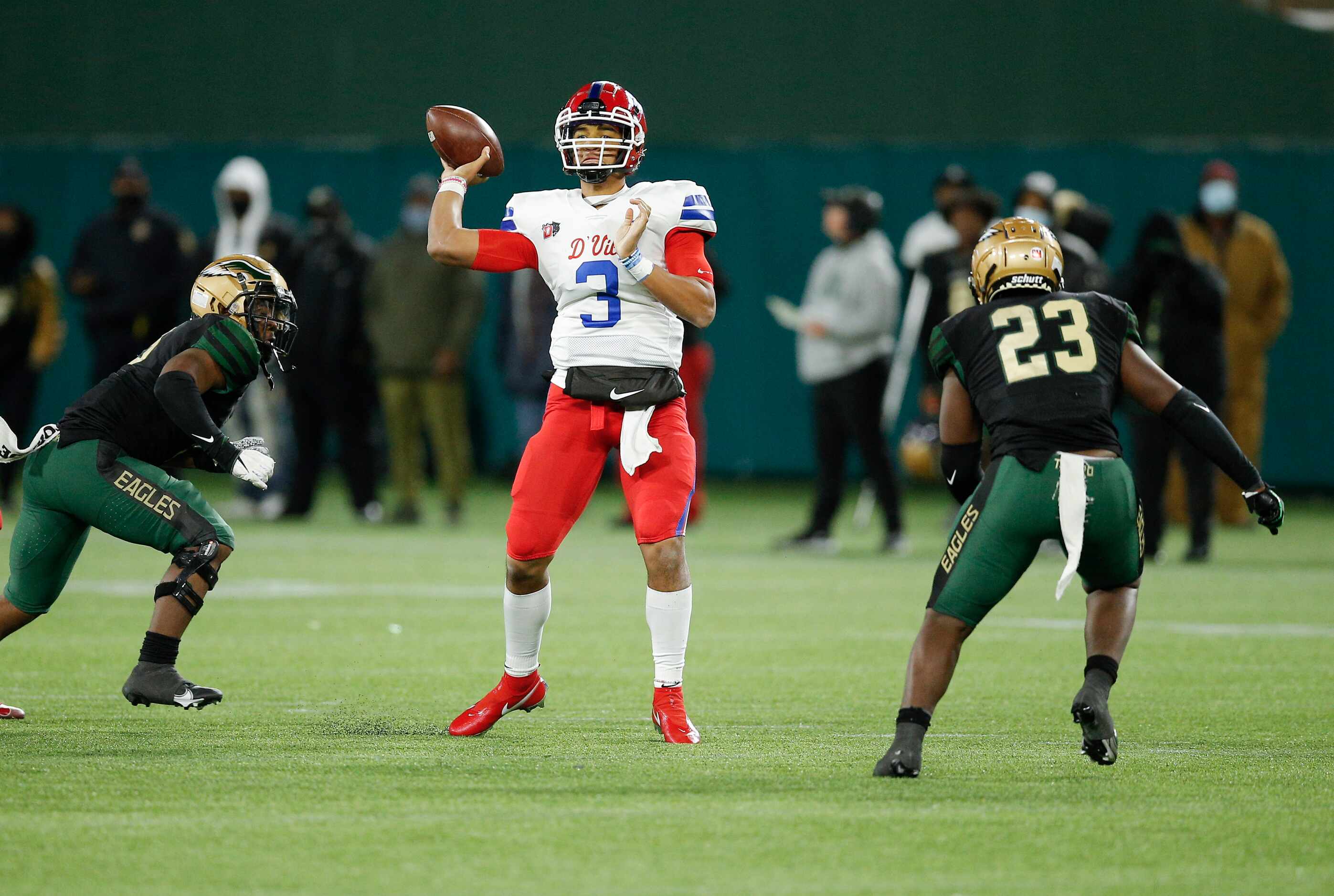 Duncanville senior quarterback Grayson James (3) throws as DeSoto senior linebacker Brandon...