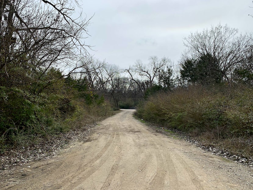 This is Kemrock Drive in southeast Dallas' Five Mile neighborhood. How many dirt roads are...