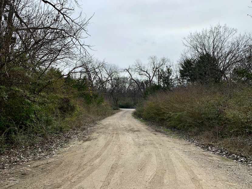 This is Kemrock Drive in southeast Dallas' Five Mile neighborhood. How many dirt roads are...