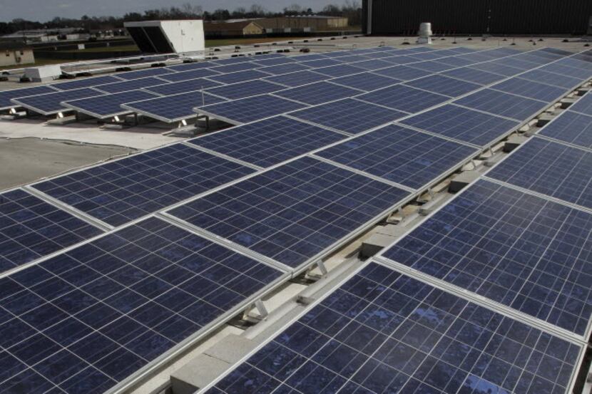 Solar Panels on the roof of a high school in Pasadena. (AP Photo/Pat Sullivan)
