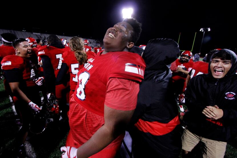 At 6'5 and 395 pounds, Mesquite Horn offensive lineman Darryl Morant (78) savors the moment...