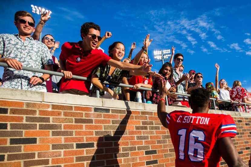 Southern Methodist Mustangs wide receiver Courtland Sutton (16) celebrates with fans after a...