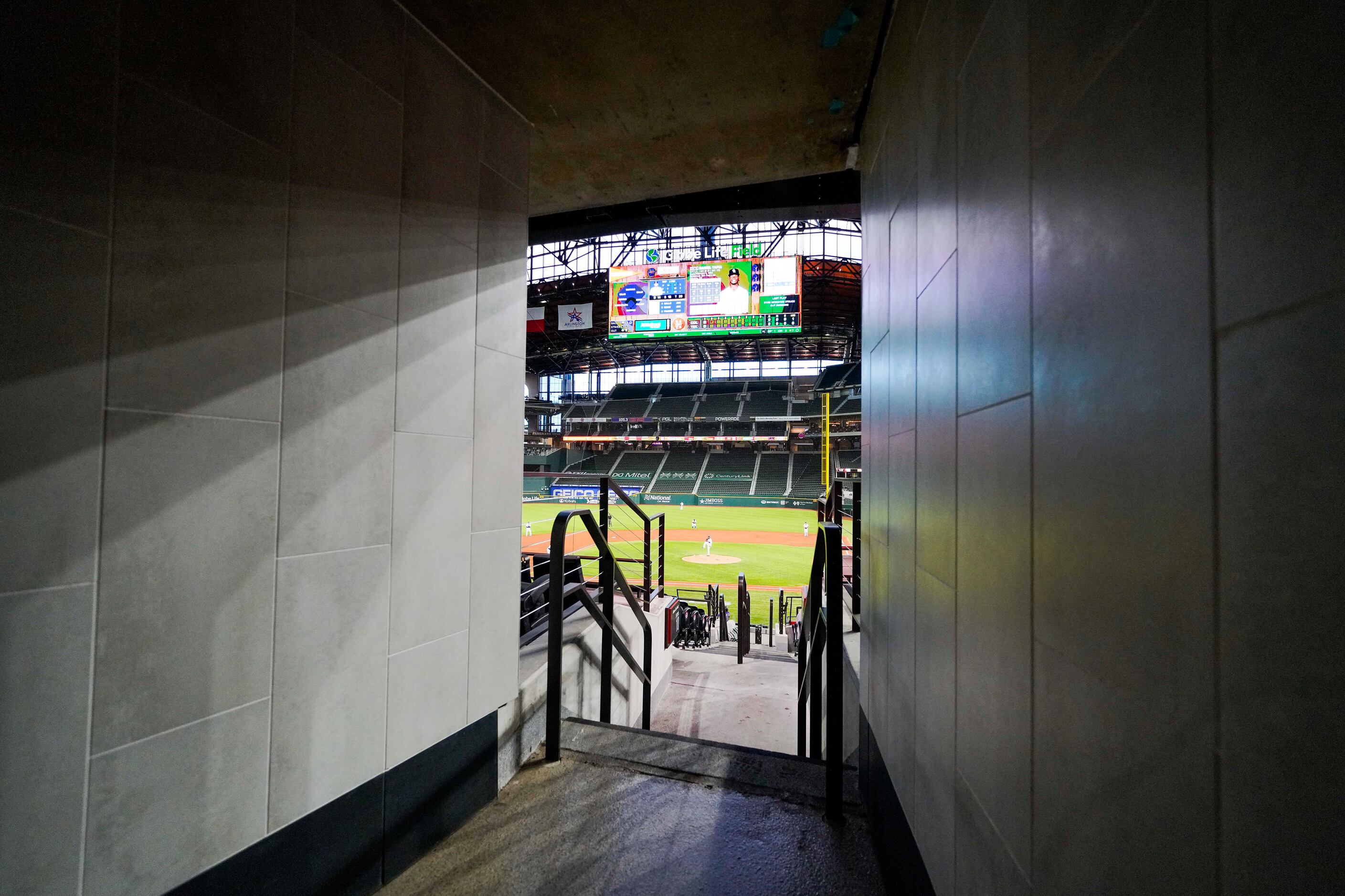 Texas Rangers pitcher Lance Lynn pitches in an empty stadium during the second inning...