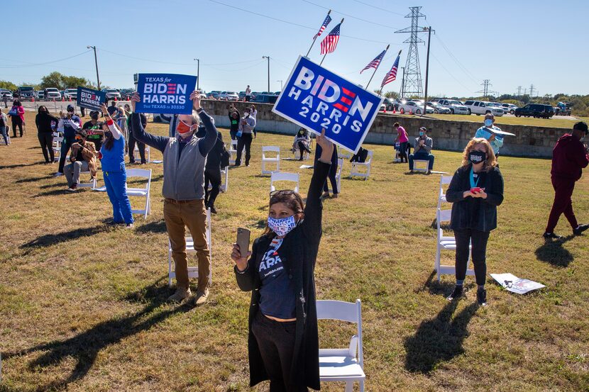 Supporters cheer as Democratic Party vice presidential nominee Kamala Harris speaks during a...