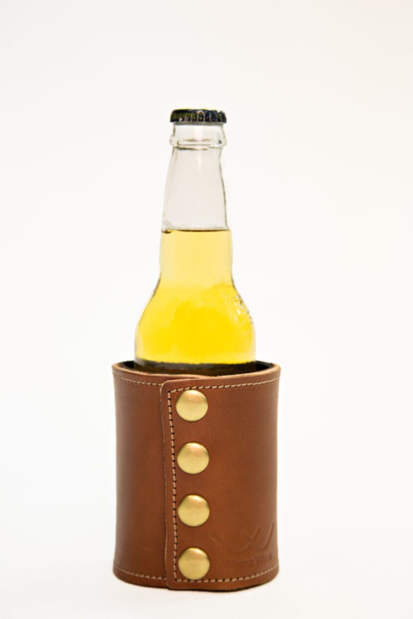 Coozie from Whitewing has neoprene liner that is sewed on the inside of the leather in order...