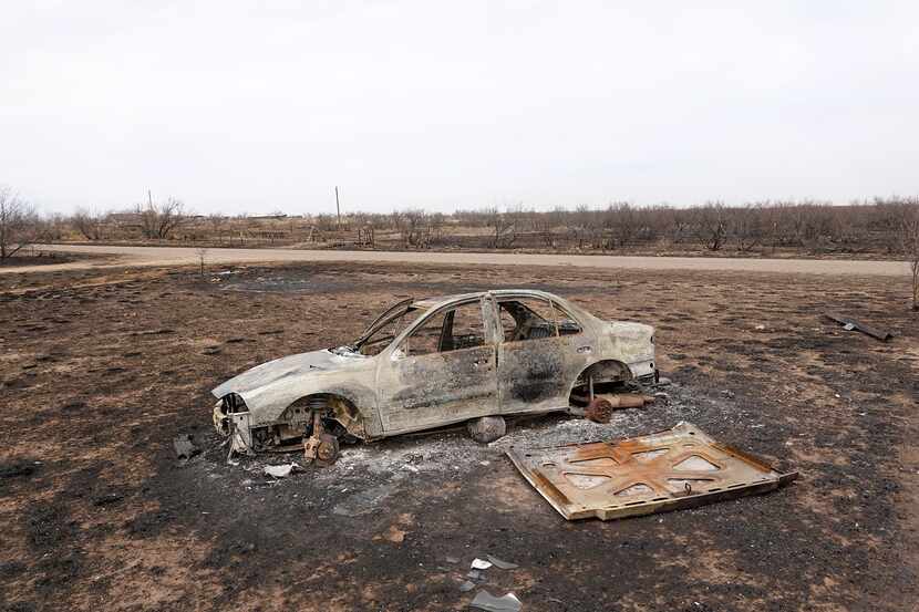 Gutted, charred vehicles are a common sight in areas left devastated by the Texas Panhandle...
