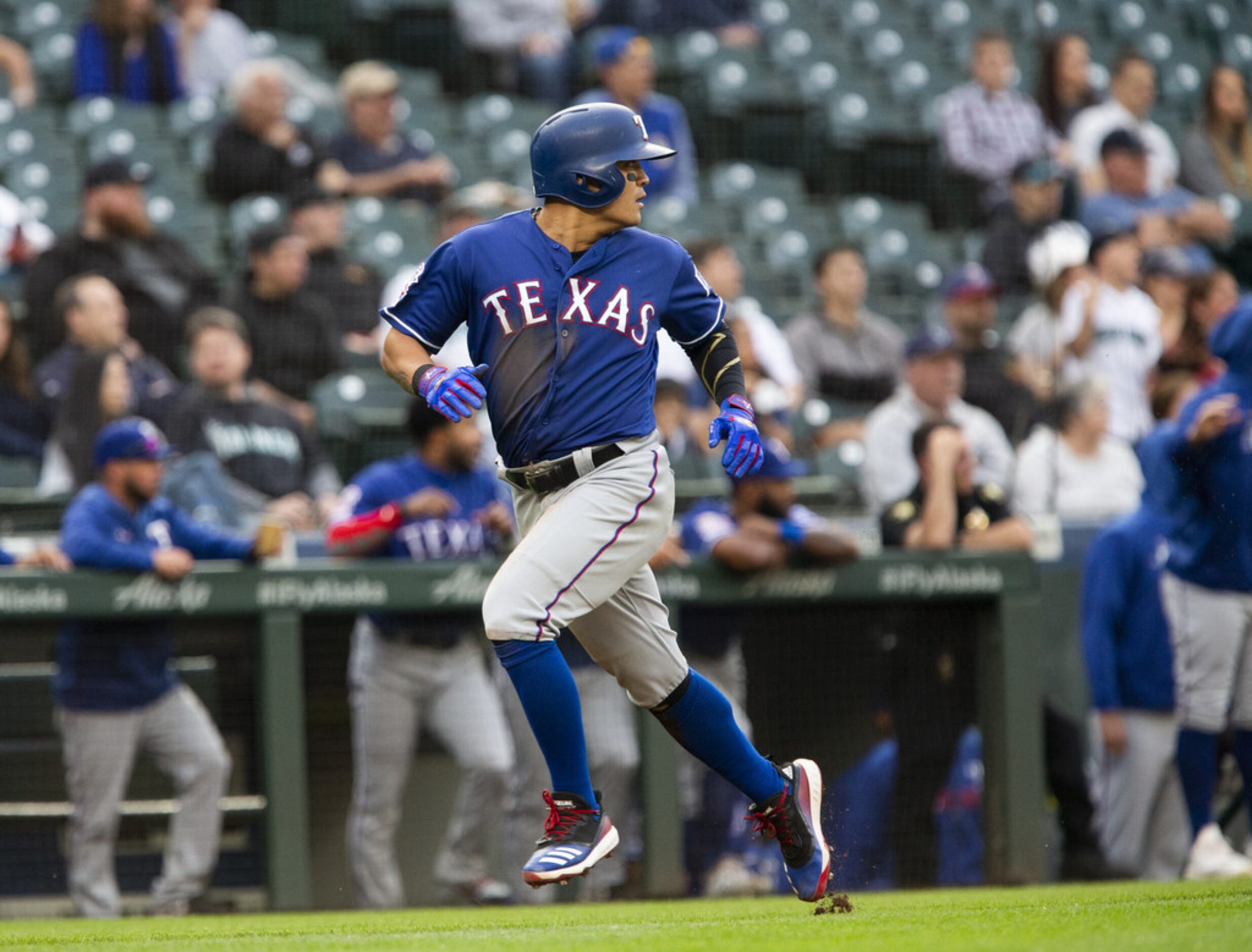 SEATTLE, WA - MAY 28:  Shin-Soo Choo #17 of the Texas Rangers looks back at third base as he...