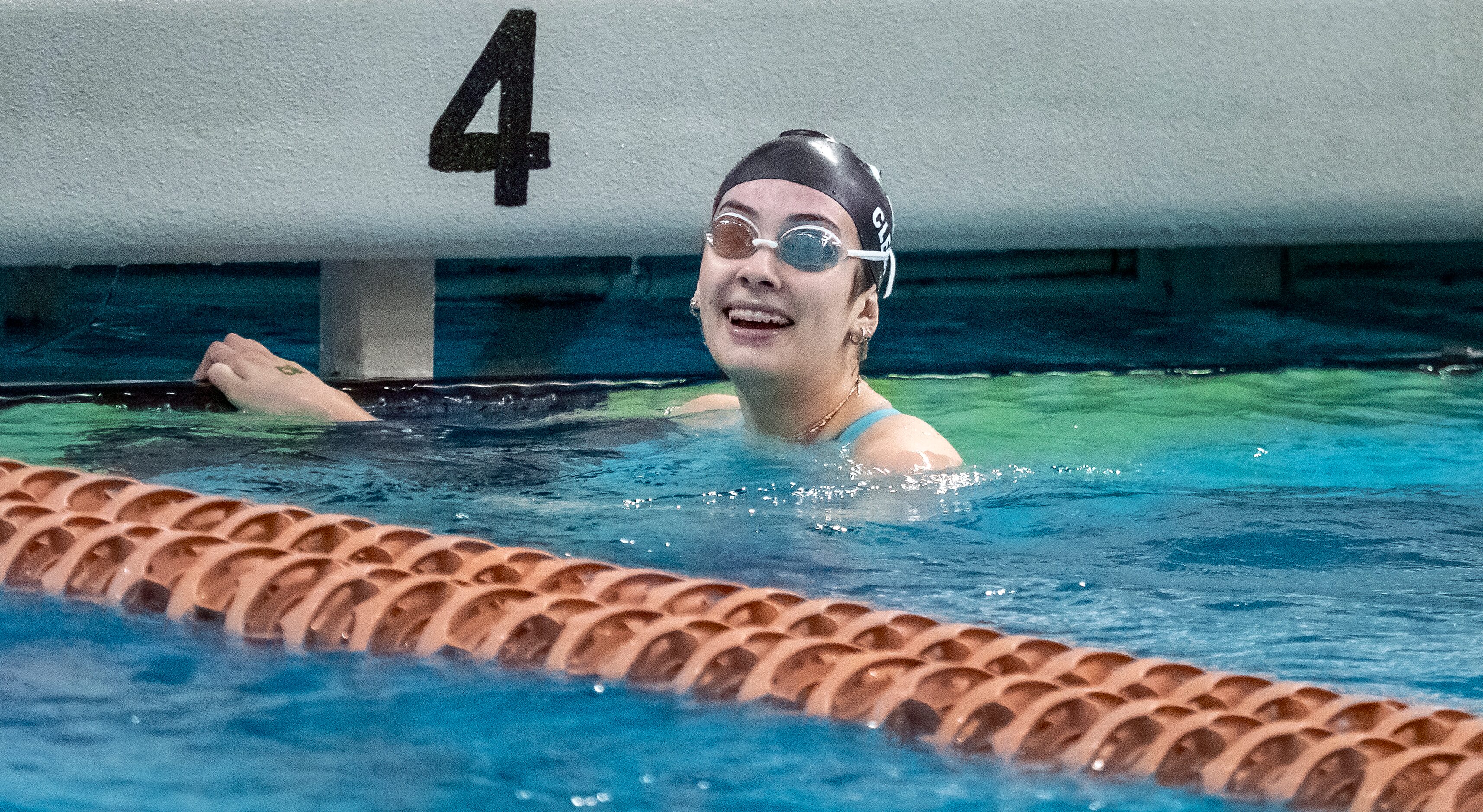 Southlake Carroll’s Marin Clem, looks towards her team bench after winning her heat in the...