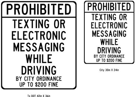  Road signs in Denton alert drivers to city's ban on texting and driving.