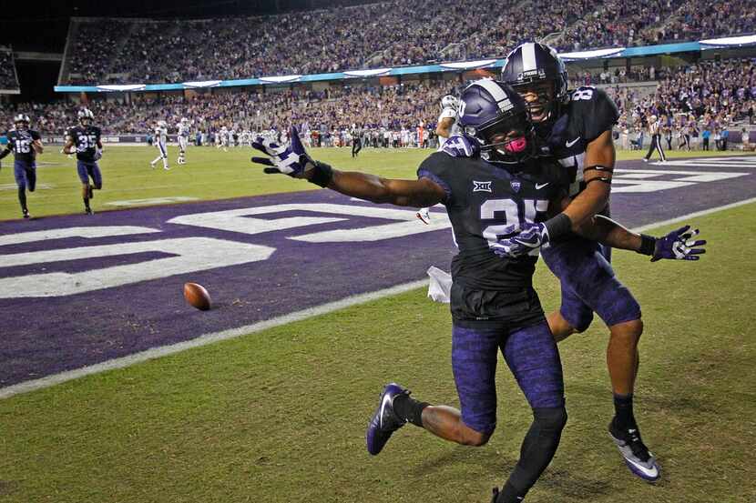 Texas Christian wide receivers KaVontae Turpin (25) and TreVontae Hights (87) in the end...