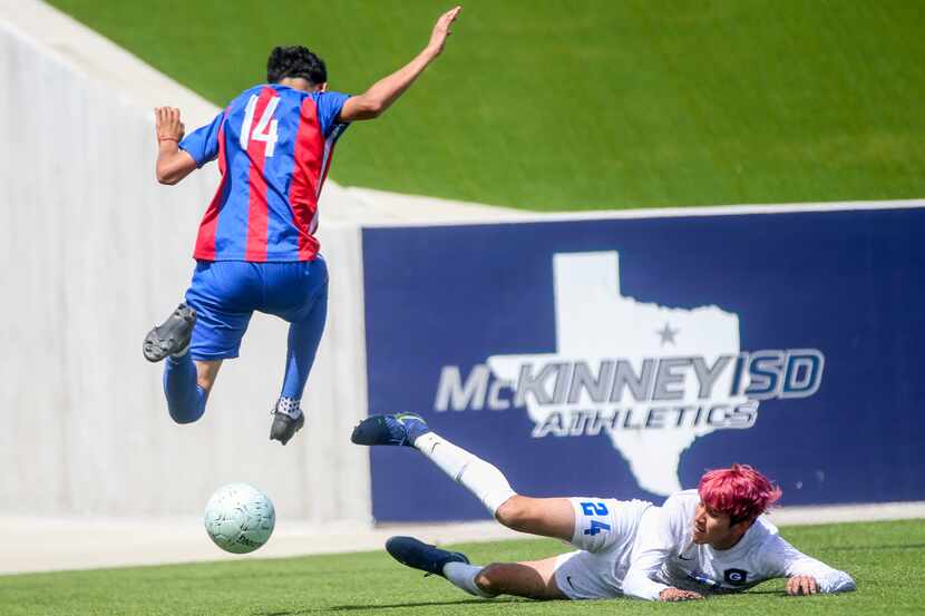 Sam Houston midfielder Leonardo Ramirez (14) avoids a tackle form Grand Prairie center back...