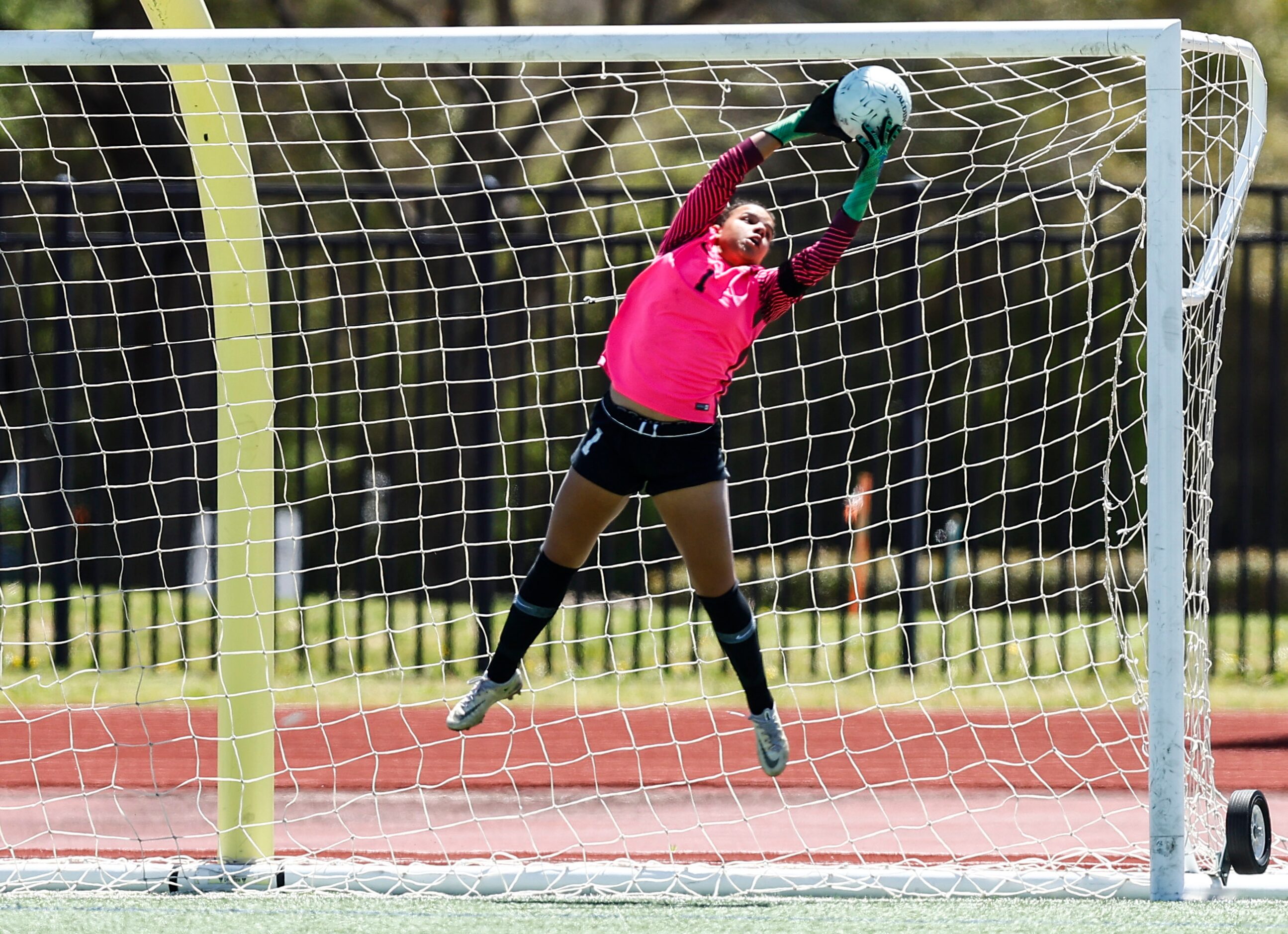 Frisco goalkeeper Ariana Anderson catches a shot on goal during the Class 5A Region II...