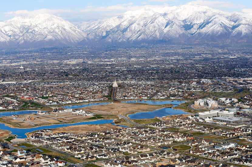FILE - Homes in suburban Salt Lake City are shown, April 13, 2019. According to estimates...