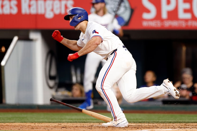 Texas Rangers left fielder Wyatt Langford (36) reacts after hitting a walk-off single during...