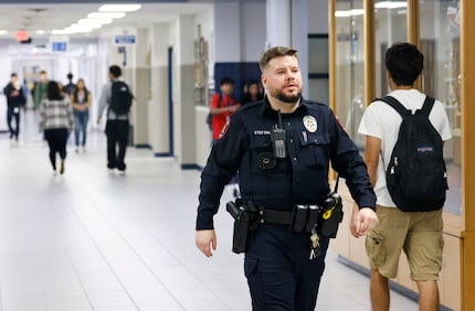 Carrollton Police School Resource Officer Nik Stefanovic headed to the school clinic to...