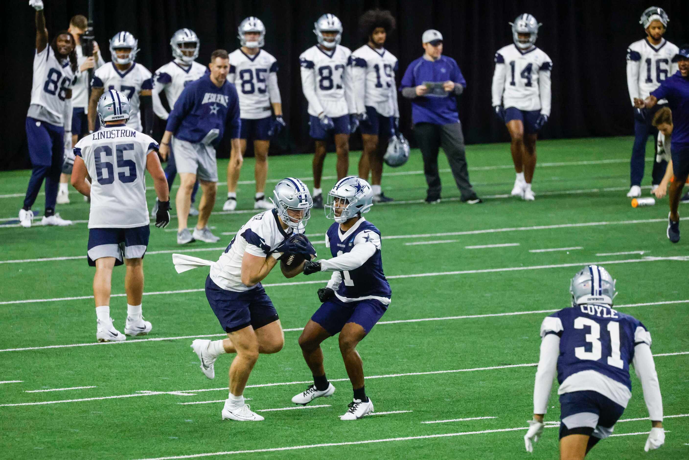 Dallas Cowboys players take part in OTA practice on Thursday, May 25, 2023 at the Star in...