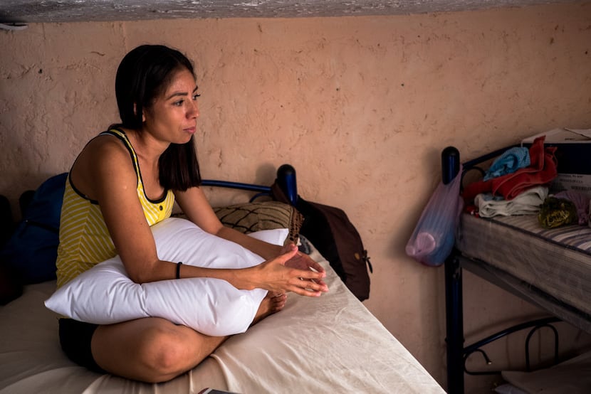 Norma Ramirez Sandoval, 31, an asylum-seeker from Guatemala, sits on a bunk-bed at El Buen...