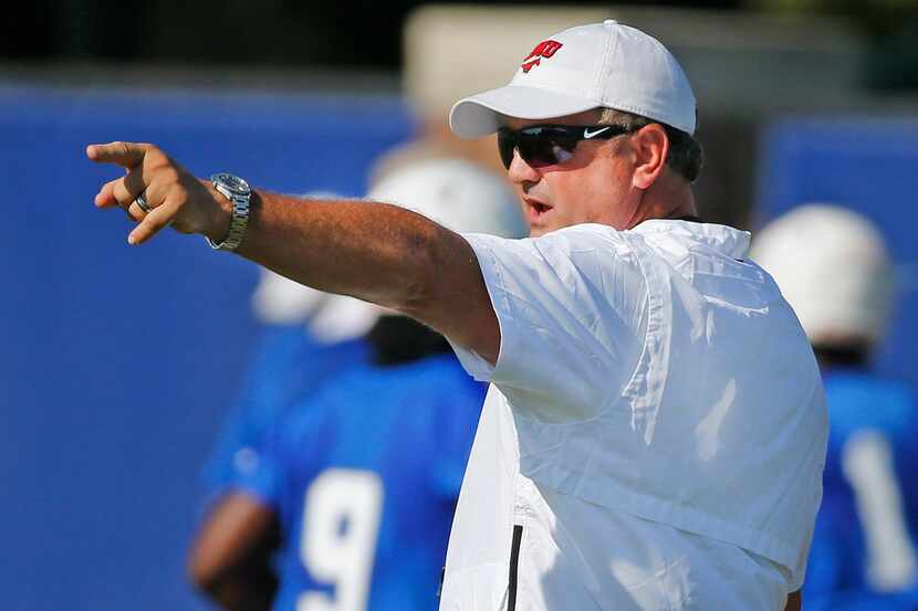New SMU head coach Sonny Dykes is pictured during SMU football practice on campus in Dallas...