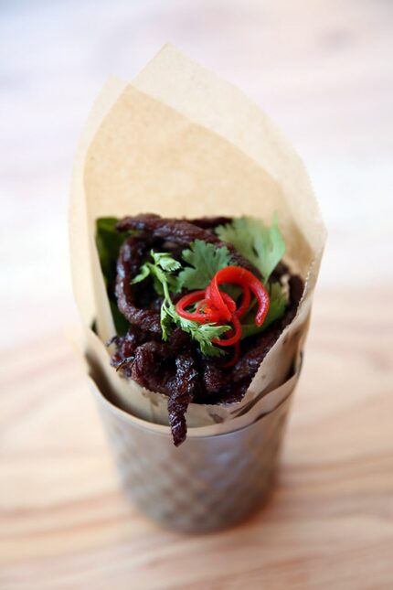 Kin Kin Urban Thai's tai beef jerky is a soy-marinated dehydrated beef.