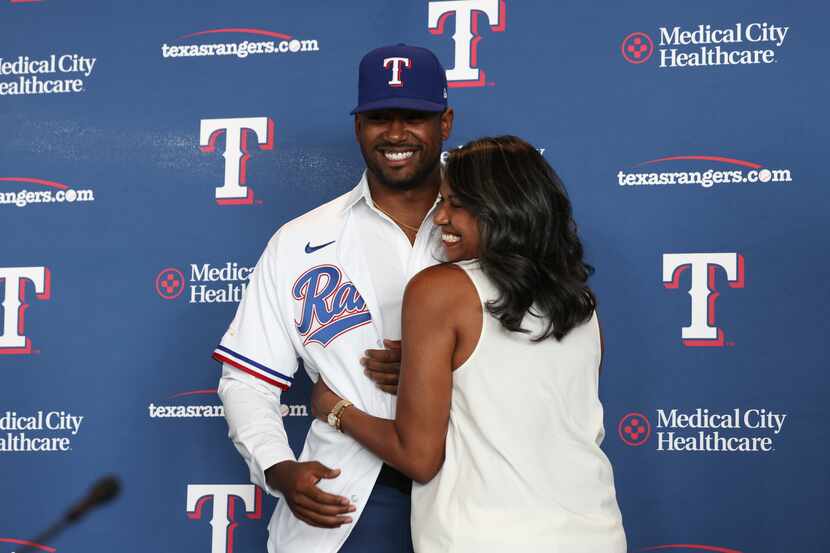 Kumar Rocker, first-round draft pick, gets hugged by his mother, Lalitha Rocker after the...