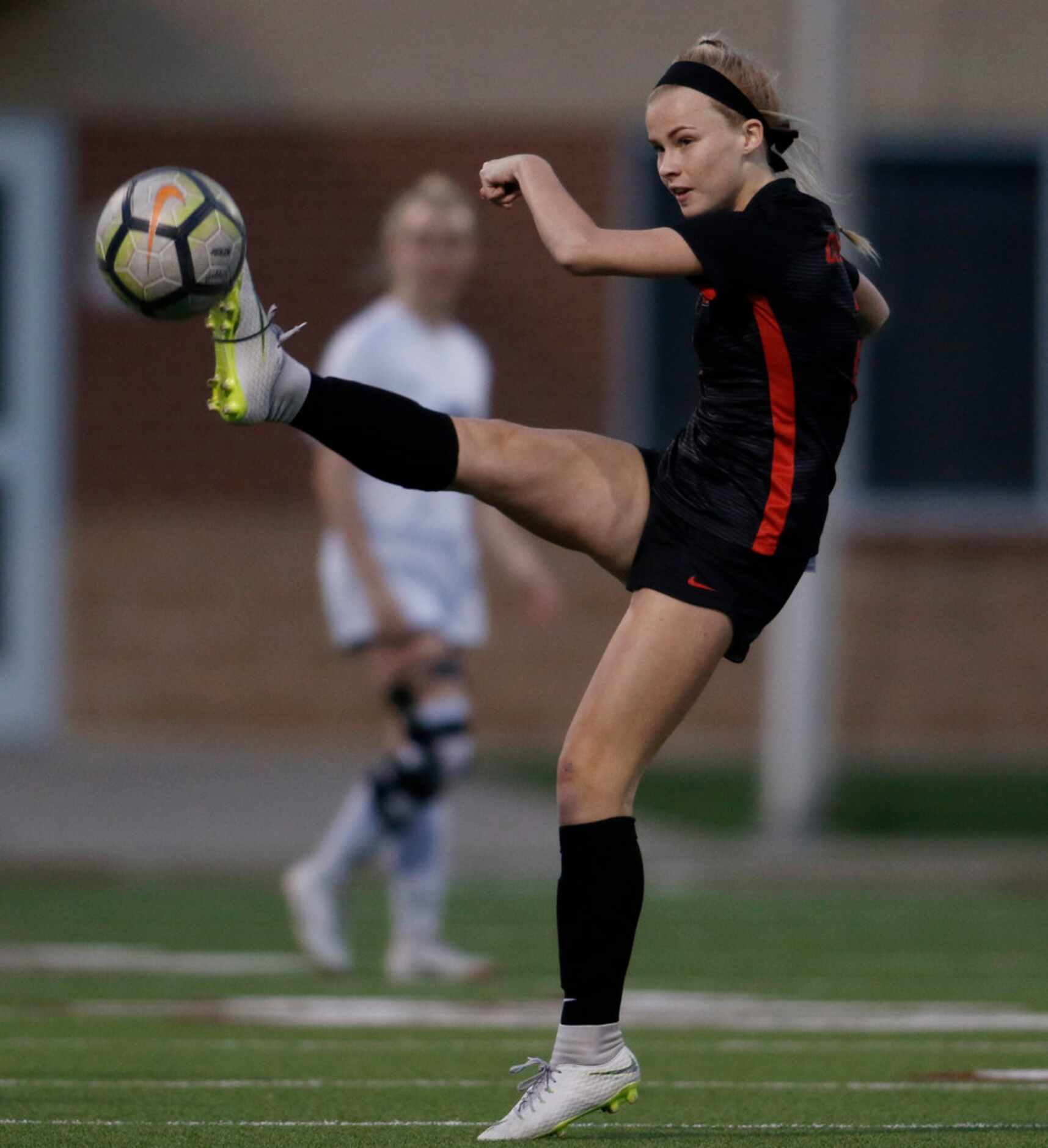 Coppell's Ryley Andrews (2) airmails a kick upfield to a teammate during first half action...
