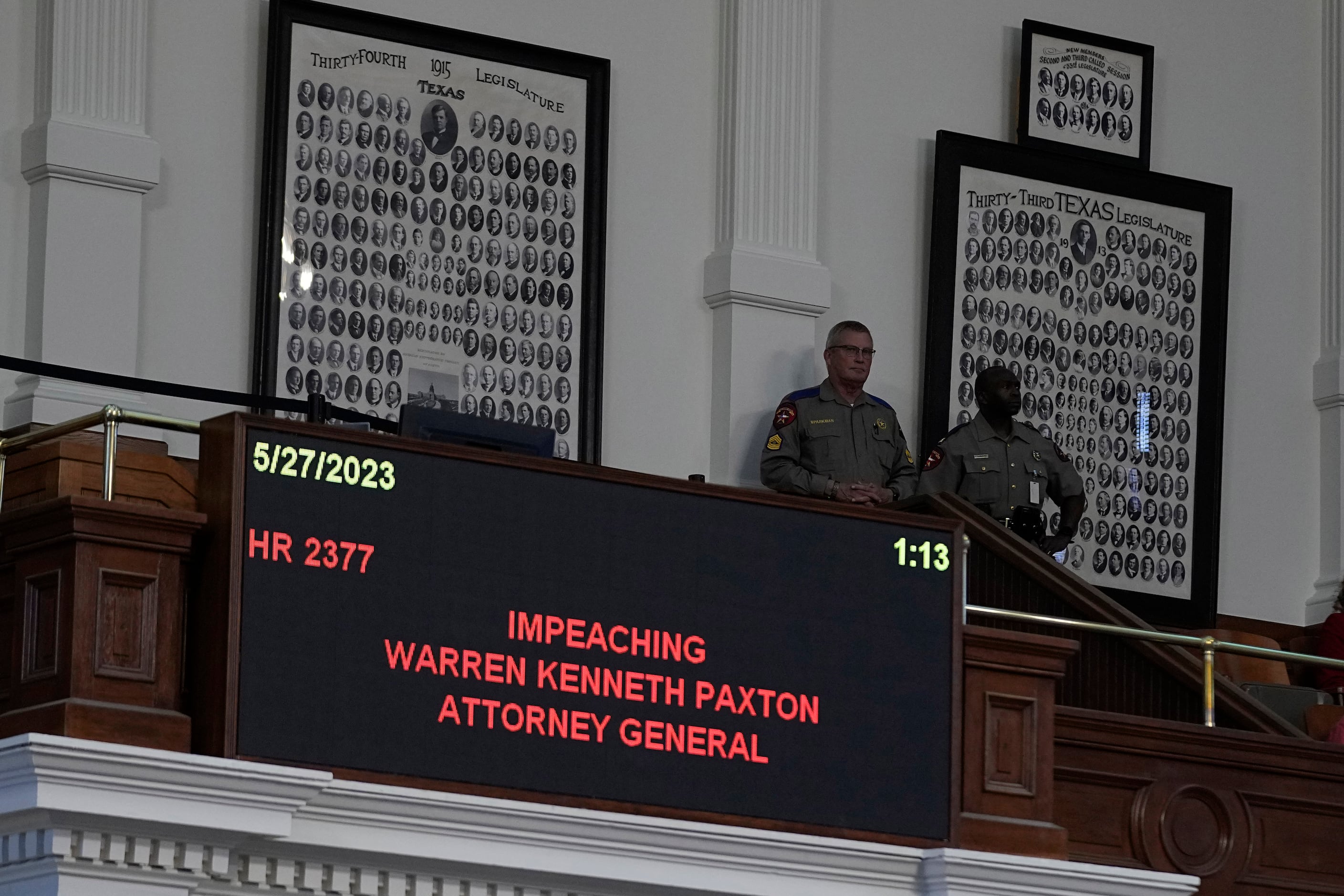 Texas troopers watch over the impeachment proceedings against state Attorney General Ken...