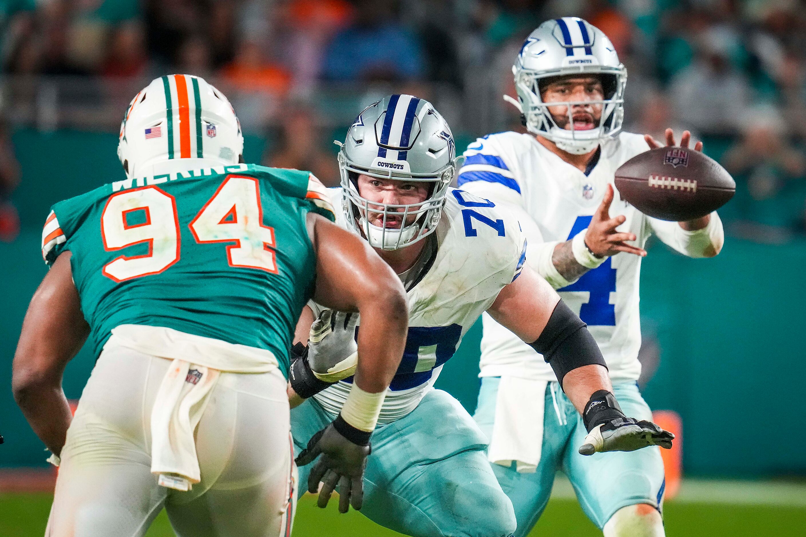 Dallas Cowboys guard Zack Martin (70) works against Miami Dolphins defensive tackle...