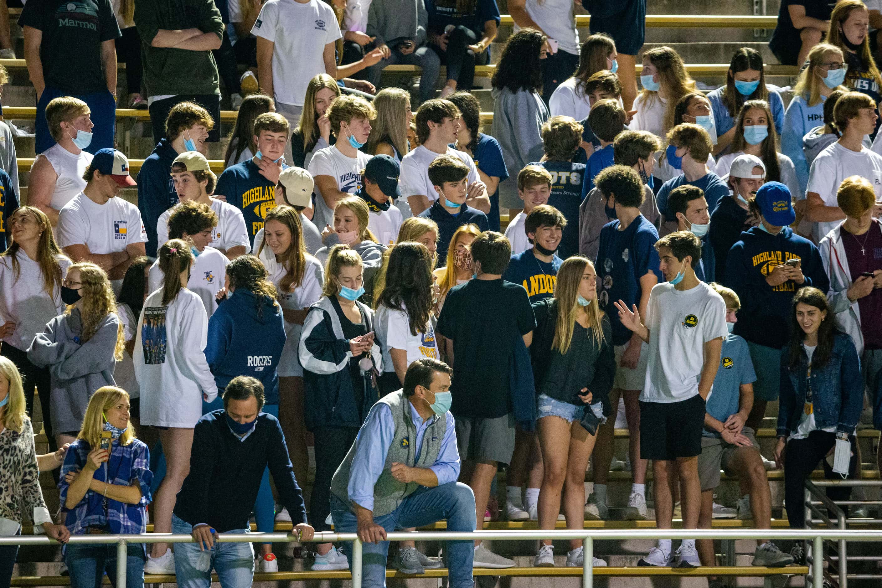 The Highland Park student section watches the first half of the District 7-5A Division I...