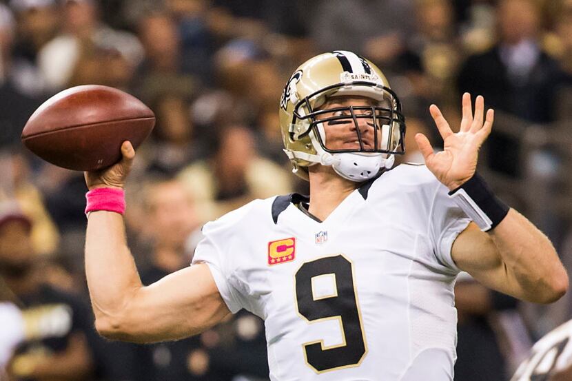 New Orleans Saints quarterback Drew Brees (9) throws a pass during the first half of an NFL...