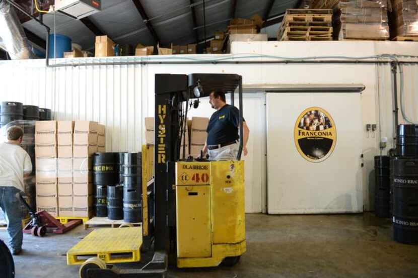 
Dennis Wehrmann works the forklift at Franconia Brewing Company in McKinney. Wehrmann, born...