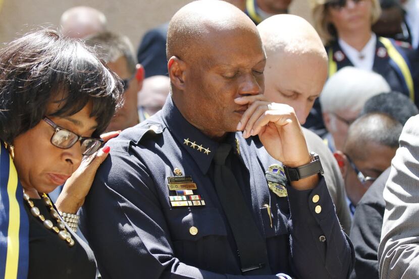 Dallas Police Chief David Brown paused during a citywide prayer service in downtown Dallas...