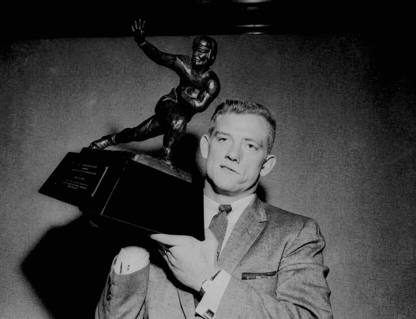 Texas A&M's John David Crow displays his newly claimed Heisman Trophy 