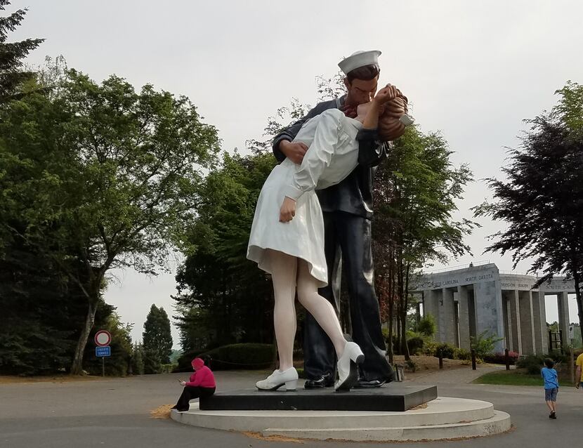 A statue outside the Bastogne War Museum re-creates the iconic kiss as the Allies celebrated...