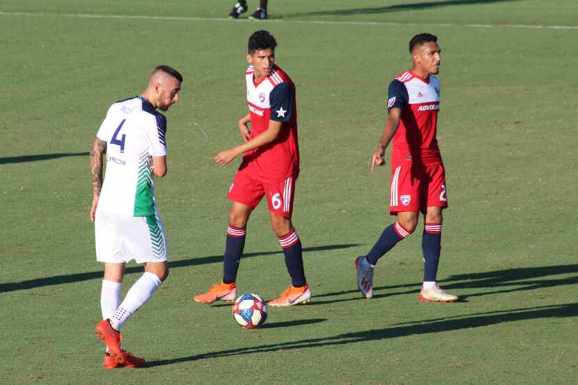 Jesus Ferreira points to the spot where he believes a foul should have been called against...