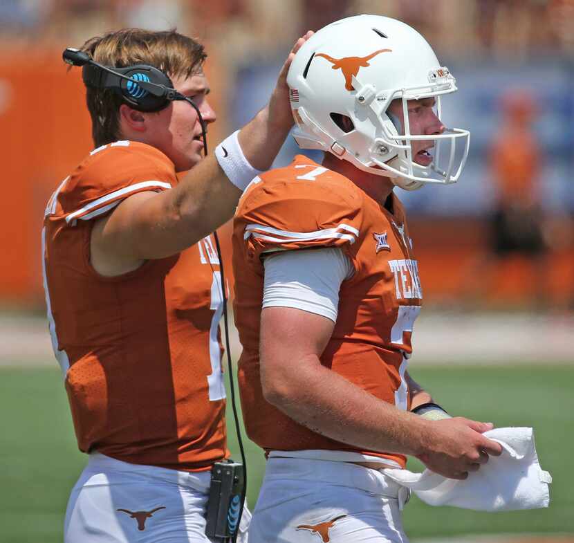 Texas Longhorns quarterbacks Sam Ehlinger (1) and Shane Buechele (7) are pictured during the...