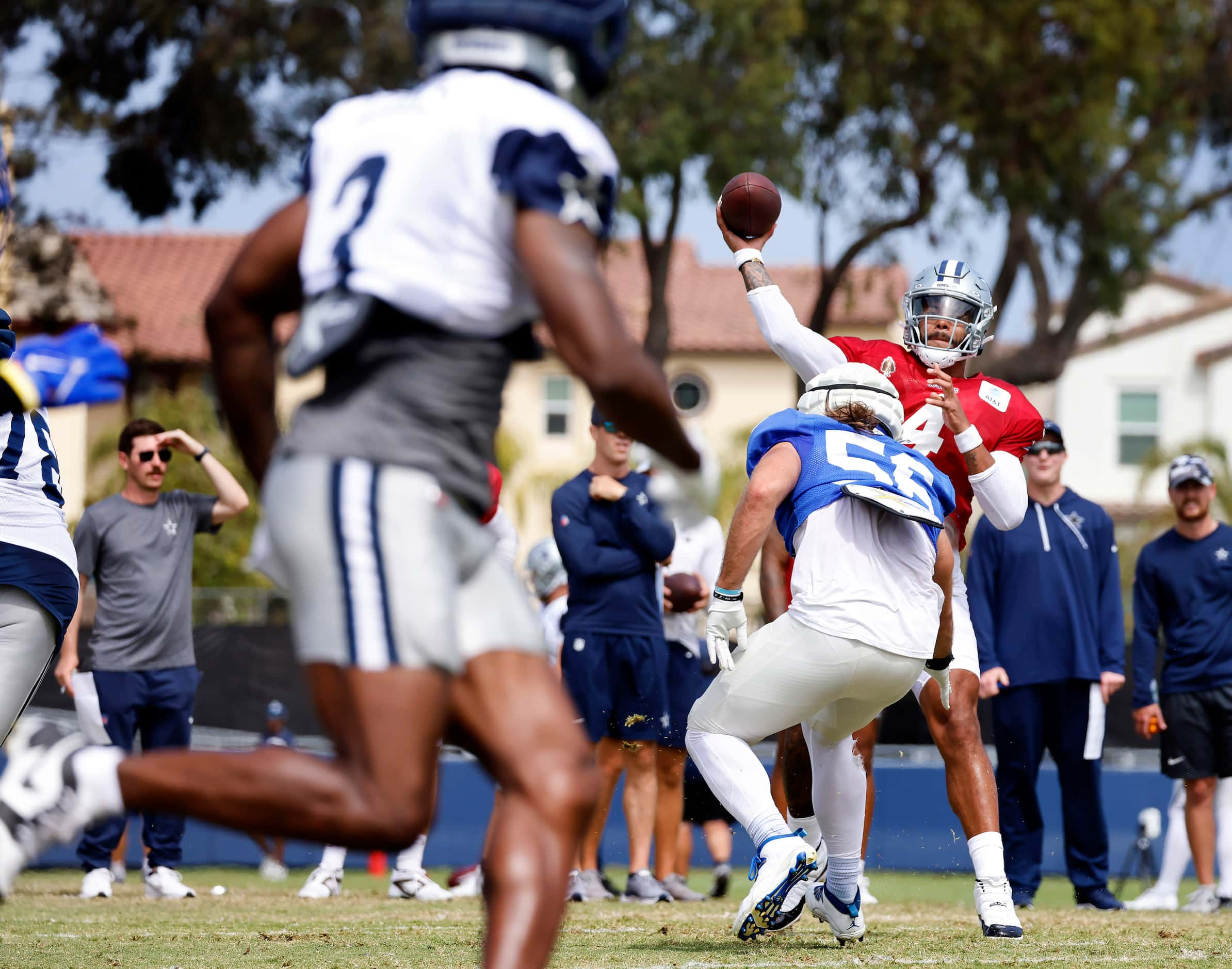 Dallas Cowboys quarterback Dak Prescott (4) fires a red zone pass to wide receiver Brandin...