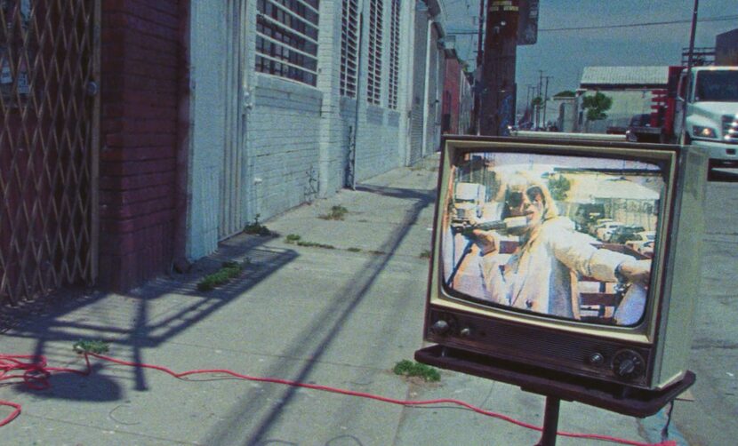 St. Vincent appears on TV in a still from the movie. The rocker says her first filmmaking...