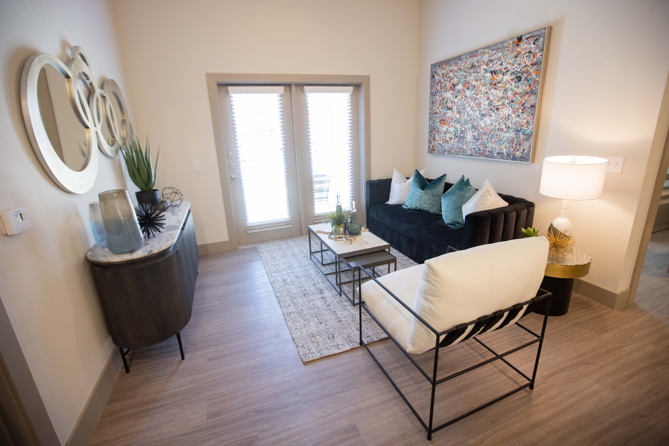 A living area in a model apartment at Palladium RedBird apartments.