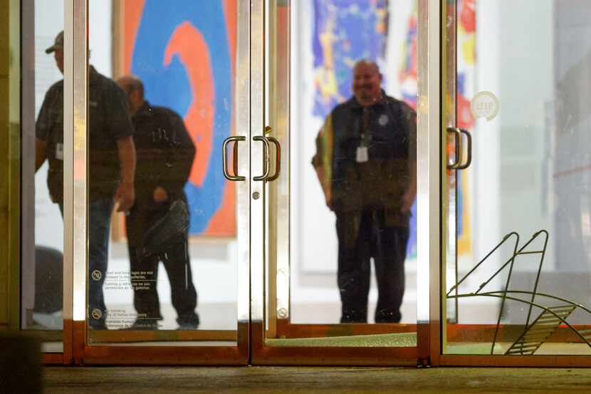 A door with broken glass after an apparent break-in at an entrance to the Dallas Museum of...