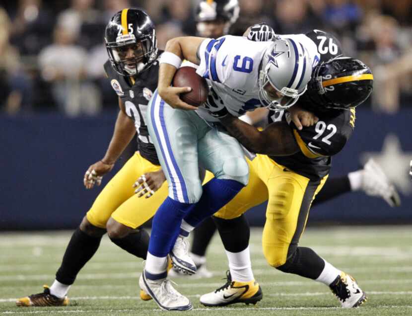 Dallas Cowboys quarterback Tony Romo (9) is sacked by Pittsburgh Steelers outside linebacker...