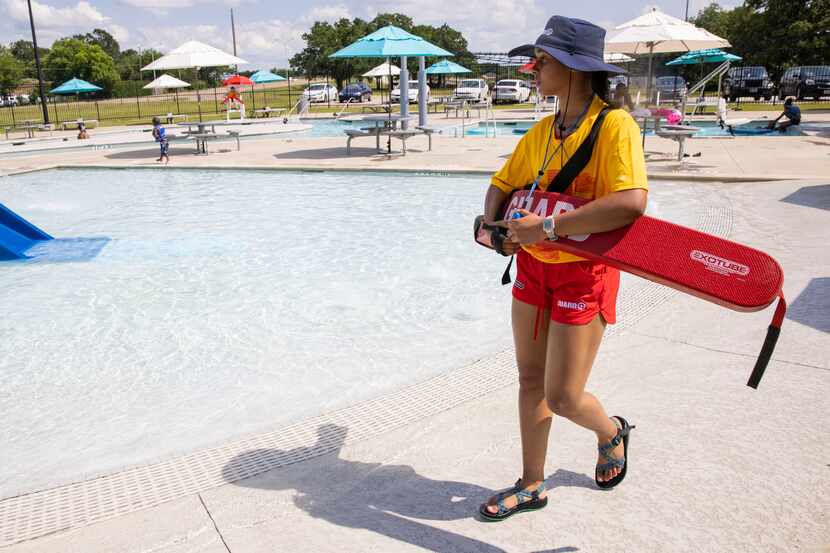 Lifeguard Jaedan Freeman, 17, watches over a pool at the Cove Aquatic Center at Crawford on...